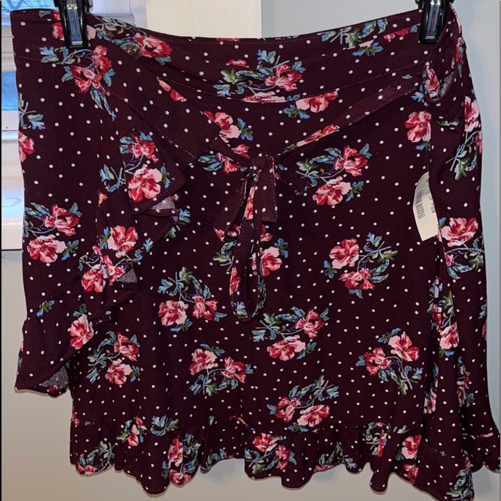 Maroon floral wrap skirt.